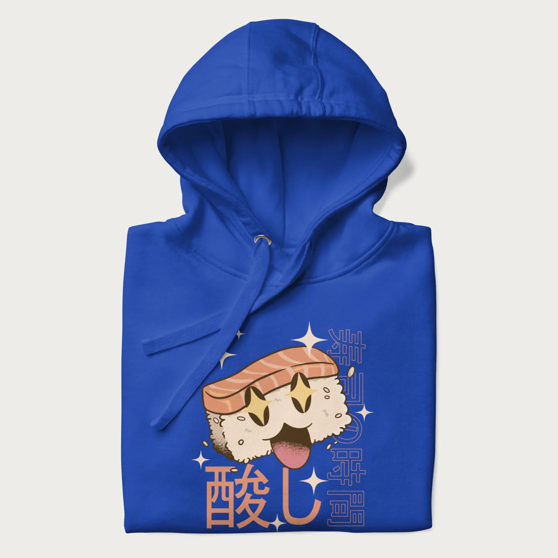 Folded royal blue hoodie with Japanese graphic of a cute sushi with sparkling eyes accompanied by Japanese text '寿司の時間' (Sushi Time).