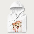 Folded white hoodie with Japanese graphic of a cute sushi with sparkling eyes accompanied by Japanese text '寿司の時間' (Sushi Time).