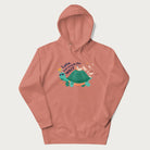 Light pink hoodie with graphic of a turtle and duck with sunglasses and the text 'Late but Worth the Wait'.