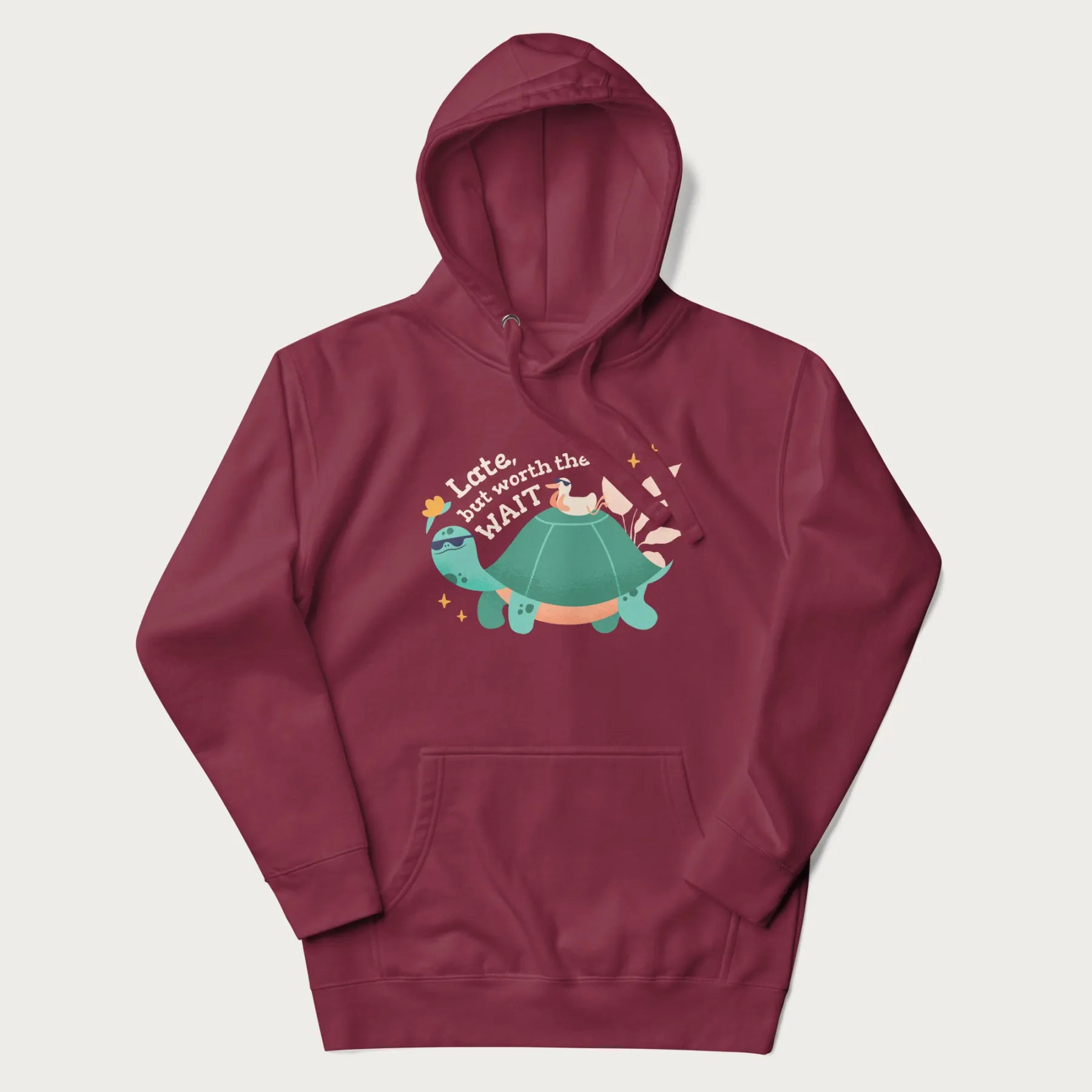 Maroon hoodie with graphic of a turtle and duck with sunglasses and the text 'Late but Worth the Wait'.