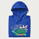 Folded royal blue hoodie with graphic of a turtle and duck with sunglasses and the text 'Late but Worth the Wait'.