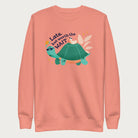 Light pink sweatshirt with a graphic of a turtle and bird wearing sunglasses with the phrase 'Late But Worth the Wait.'