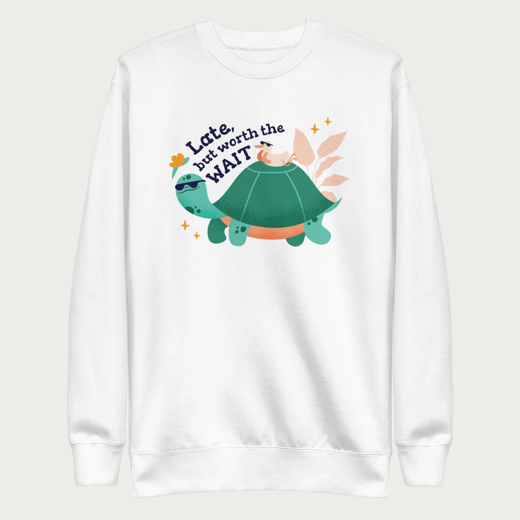 White sweatshirt with a graphic of a turtle and bird wearing sunglasses with the phrase 'Late But Worth the Wait.'