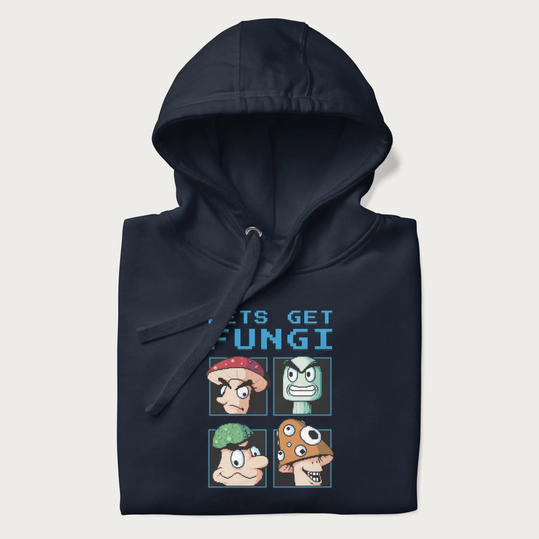 Folded navy blue hoodie with a pixel art graphic of four mushroom characters and the text 'Let's Get Fungi'.