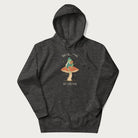 Dark grey hoodie with graphic of a dapper frog reading a book on a mushroom with the text 'Don't Be Stressing, Life's a Blessing' above and below.