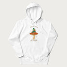 White hoodie with graphic of a dapper frog reading a book on a mushroom with the text 'Don't Be Stressing, Life's a Blessing' above and below.