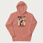 Light pink hoodie with Japanese graphic of a mech warrior in vibrant green and red, with Japanese characters symbolizing battle and courage.