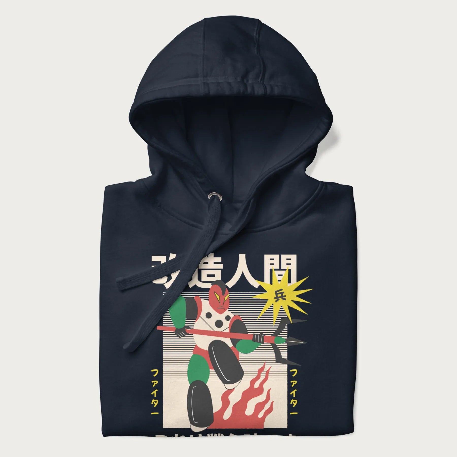 Folded navy blue hoodie with Japanese graphic of a mech warrior in vibrant green and red, with Japanese characters symbolizing battle and courage.