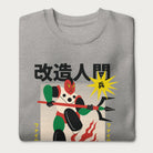 Folded light grey sweatshirt with Japanese text and a retro cyborg warrior graphic.