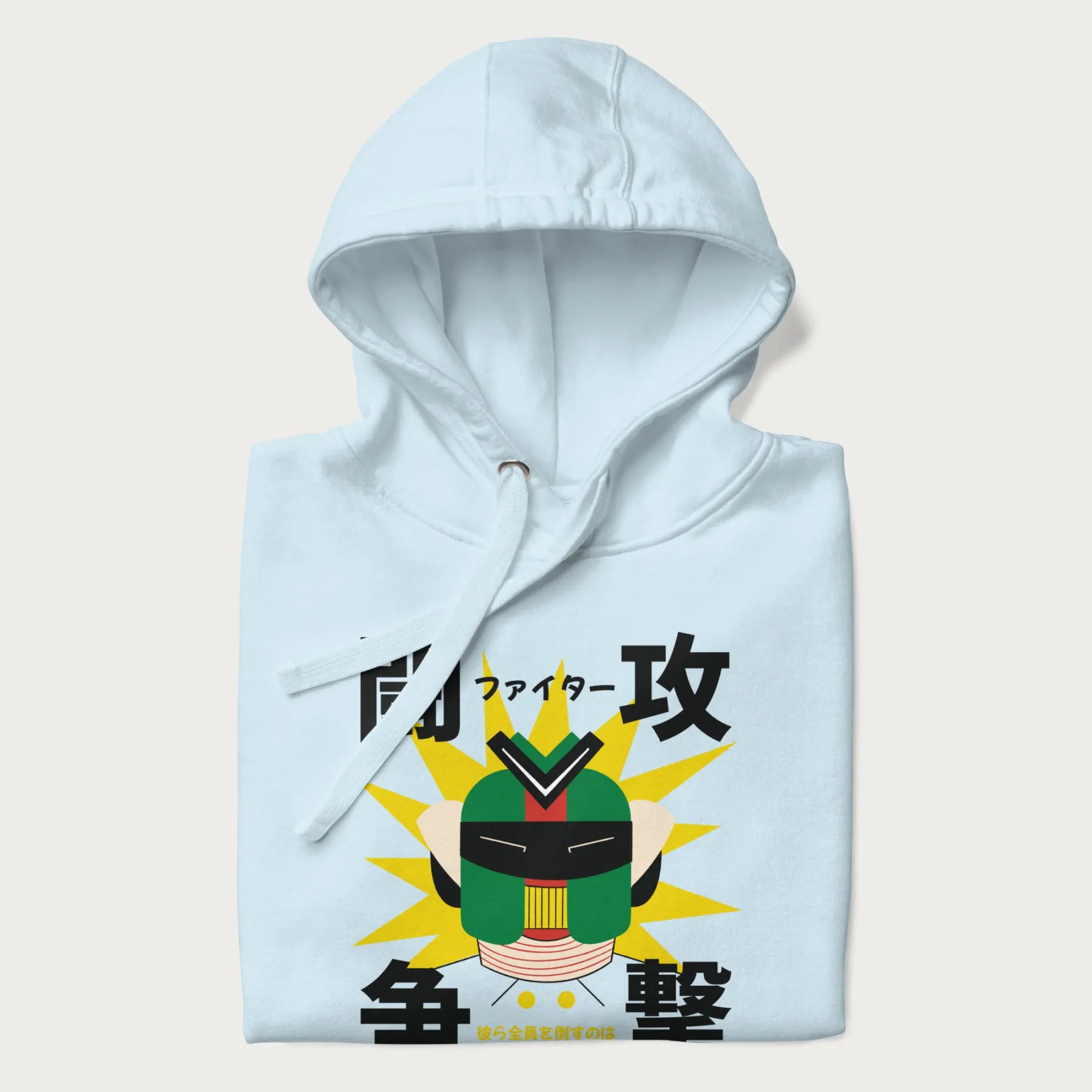 Folded light blue hoodie with retro graphic of a mecha warrior and Japanese text for "Fight," "Attack," "Conflict," and "Destiny to defeat them all".