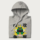 Folded light grey hoodie with retro graphic of a mecha warrior and Japanese text for "Fight," "Attack," "Conflict," and "Destiny to defeat them all".
