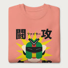 Folded light pink sweatshirt with Japanese text and a retro samurai robot graphic.