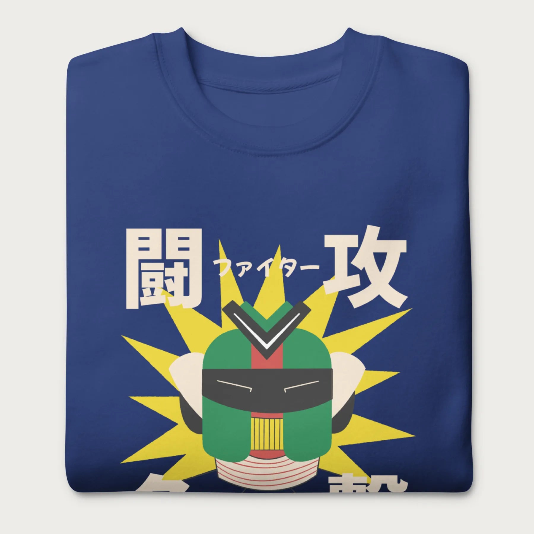 Folded royal blue sweatshirt with Japanese text and a retro samurai robot graphic.