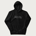 Black meow hoodie with a simple 'MEOW' text and cute cat face graphics on the front.