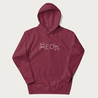 Maroon meow hoodie with a simple 'MEOW' text and cute cat face graphics on the front.