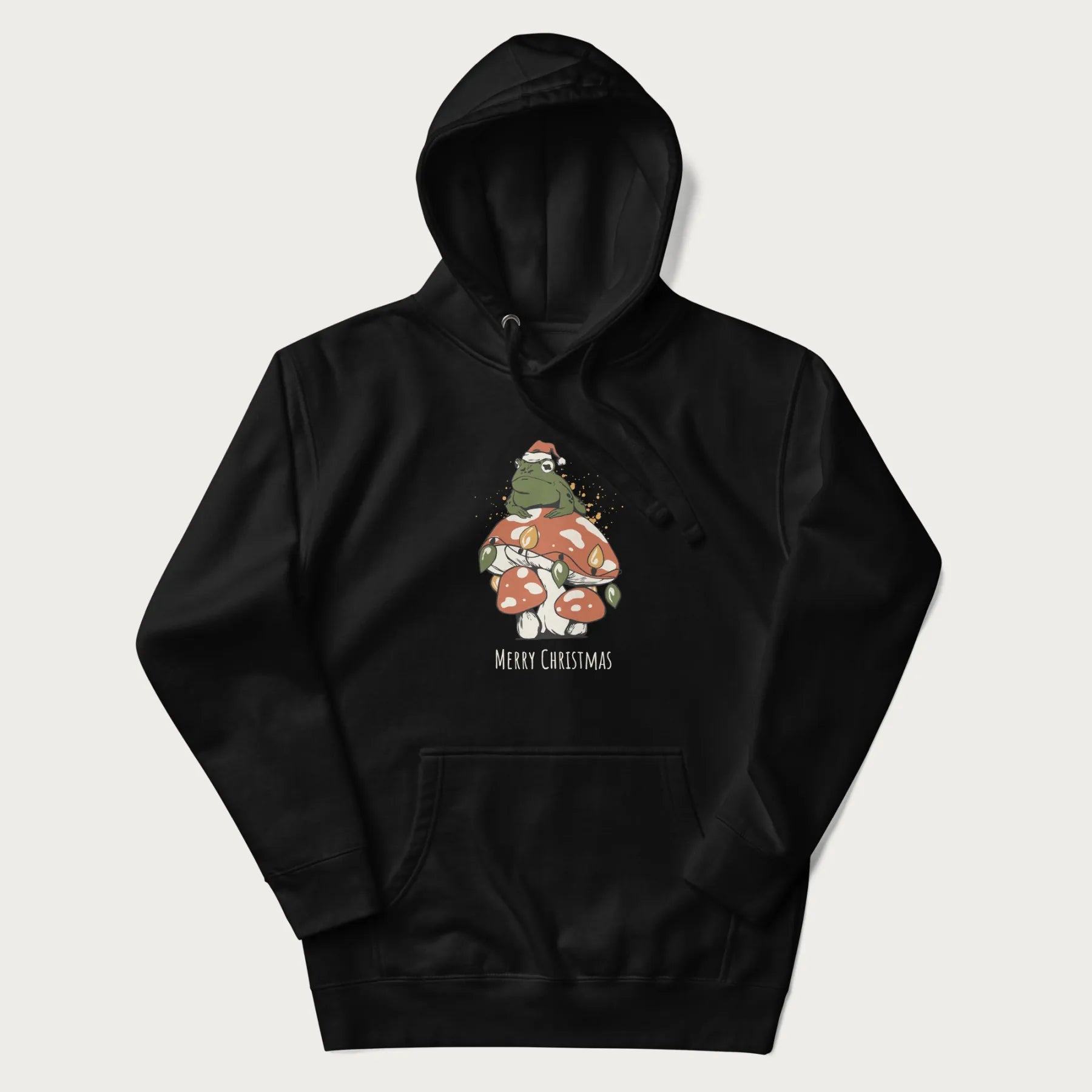 Black hoodie with graphic of a frog in a Santa hat on a mushroom with Christmas lights and the text 'Merry Christmas' below.