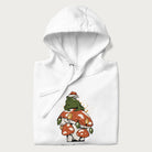 Folded white hoodie with graphic of a frog in a Santa hat on a mushroom with Christmas lights and the text 'Merry Christmas' below.