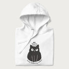 Folded white hoodie with a 'No Touchy, Touchy! Social Distancing Please!' black cat graphic design.