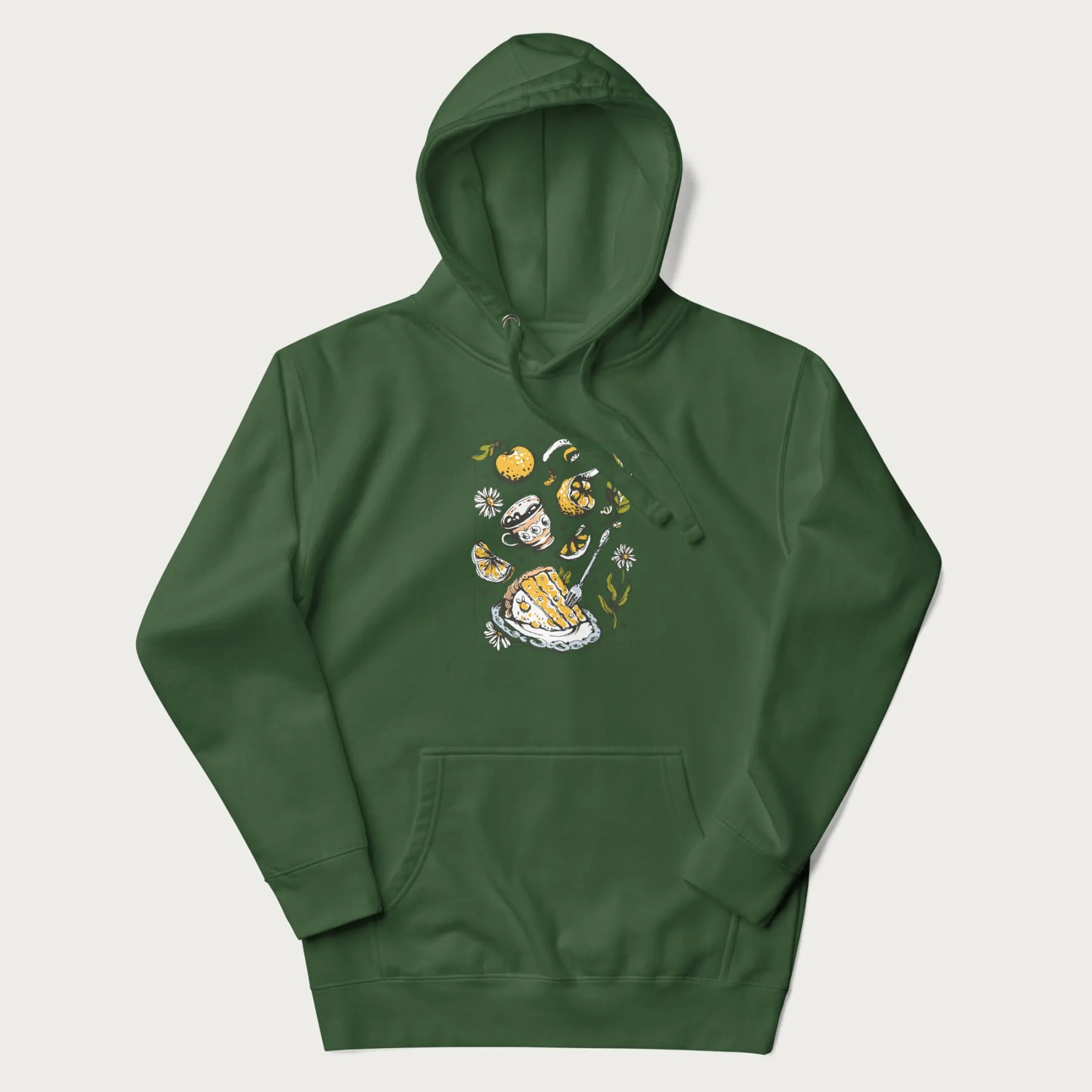 Forest green hoodie featuring a Cottagecore-themed graphic with oranges, a floral porcelain cup, orange pie, and daisies.