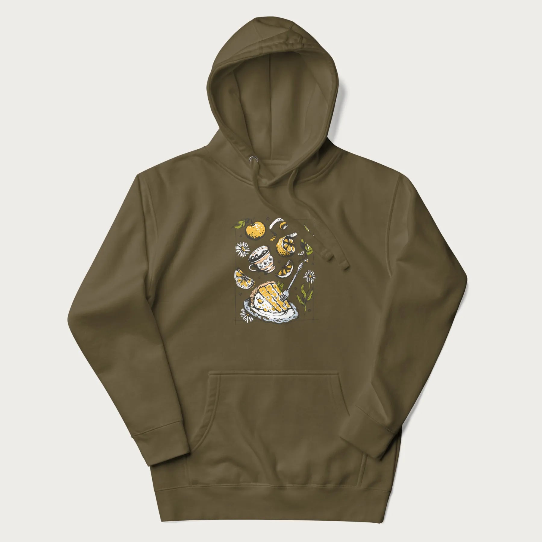 Military green hoodie featuring a Cottagecore-themed graphic with oranges, a floral porcelain cup, orange pie, and daisies.