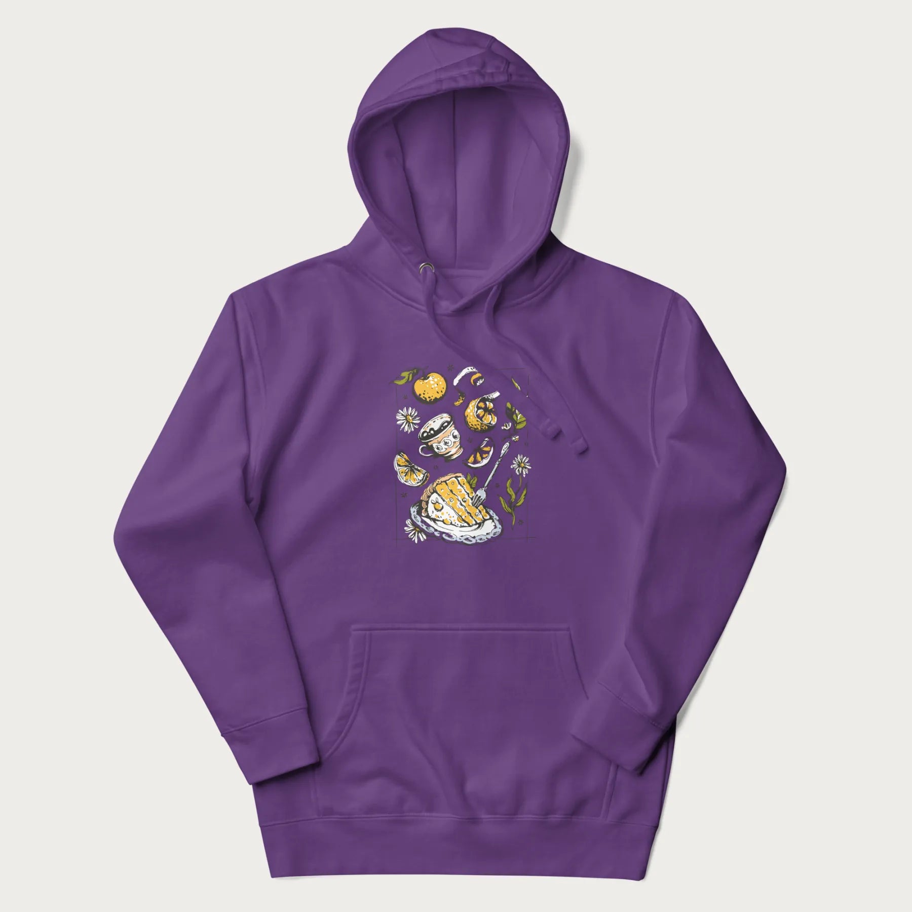 Purple hoodie featuring a Cottagecore-themed graphic with oranges, a floral porcelain cup, orange pie, and daisies.