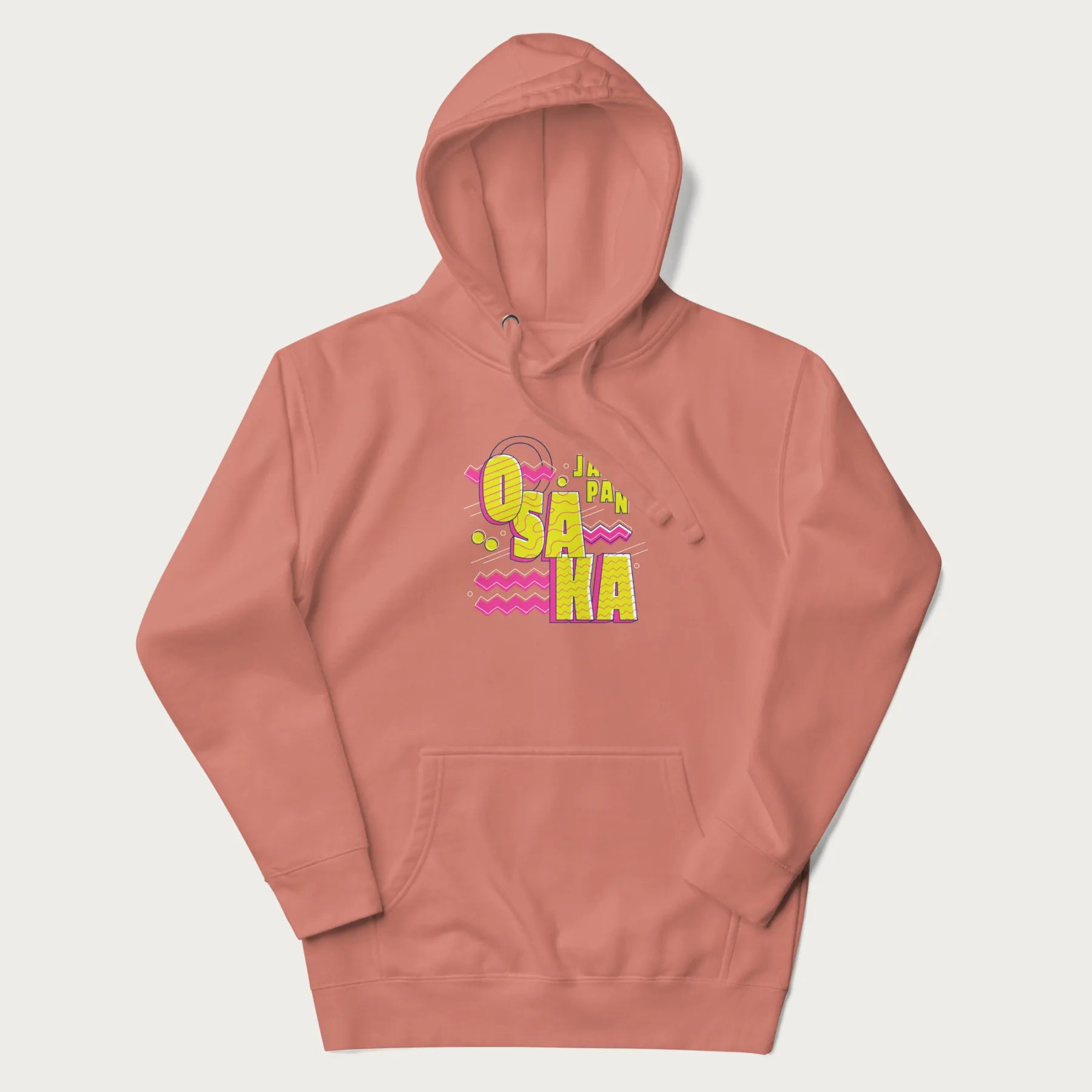 Light pink hoodie featuring a colorful 'OSAKA JAPAN' pop art design in bold pink and yellow, with abstract geometric shapes.