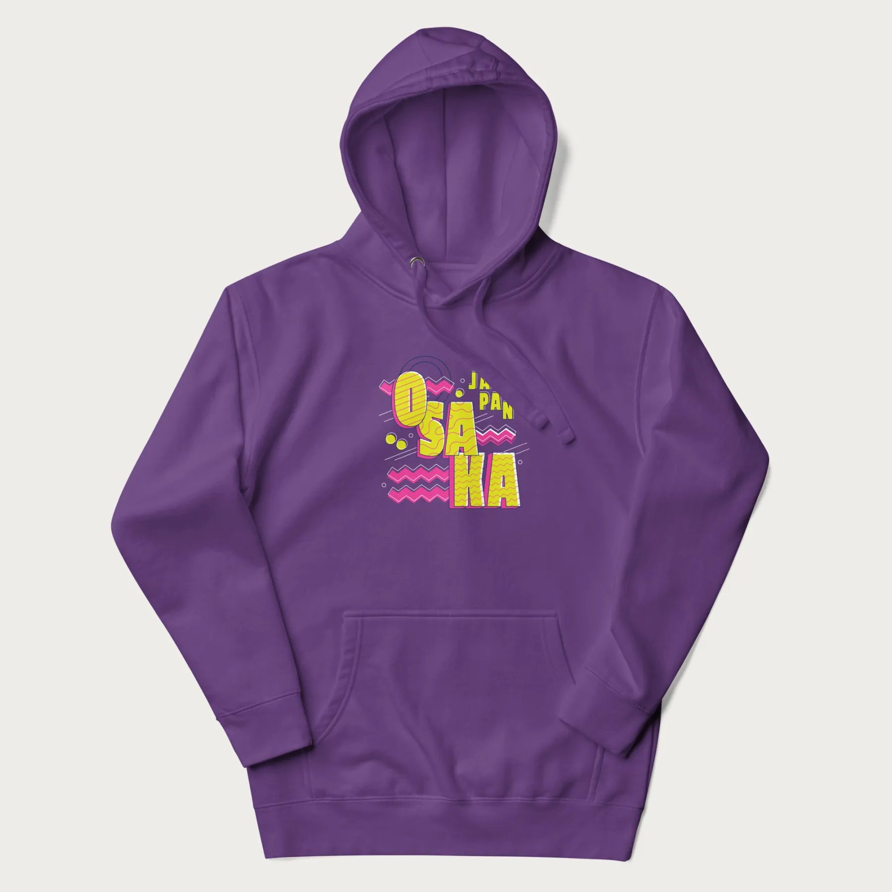 Purple hoodie featuring a colorful 'OSAKA JAPAN' pop art design in bold pink and yellow, with abstract geometric shapes.