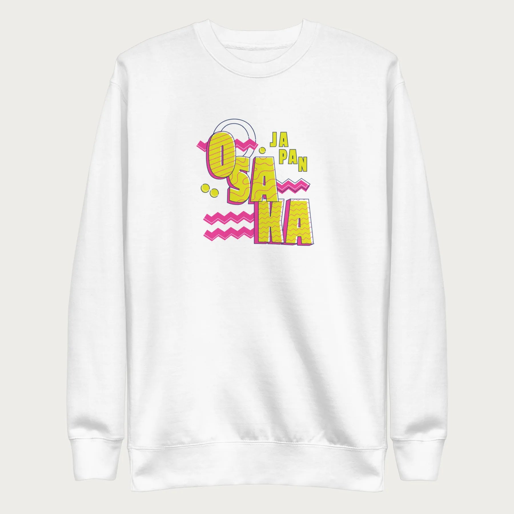 White sweatshirt with a vibrant graphic of the words "OSAKA JAPAN" in large yellow letters, surrounded by pink zigzag lines.