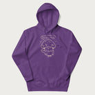 Purple hoodie with graphic of a cute mushroom waving and the text "Porto-hello!"