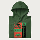 Folded forest green hoodie with mushroom psychedelic designs of surreal elements like lips, eyes, and mushrooms.