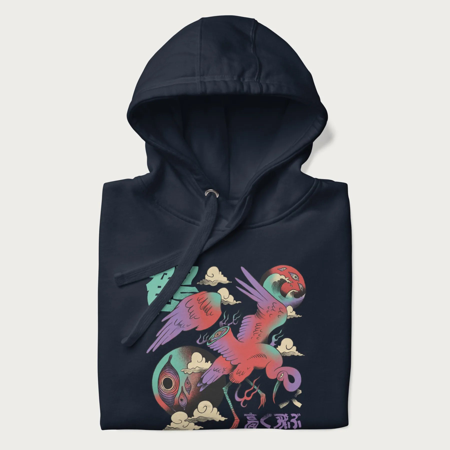 Folded navy blue hoodie with Japanese crane graphic in vibrant colors and Japanese text '鶴' (Crane) and '高く飛ぶ' (Fly High).