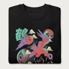 Folded black sweatshirt with a vibrant psychedelic Japanese crane graphic and Japanese text.