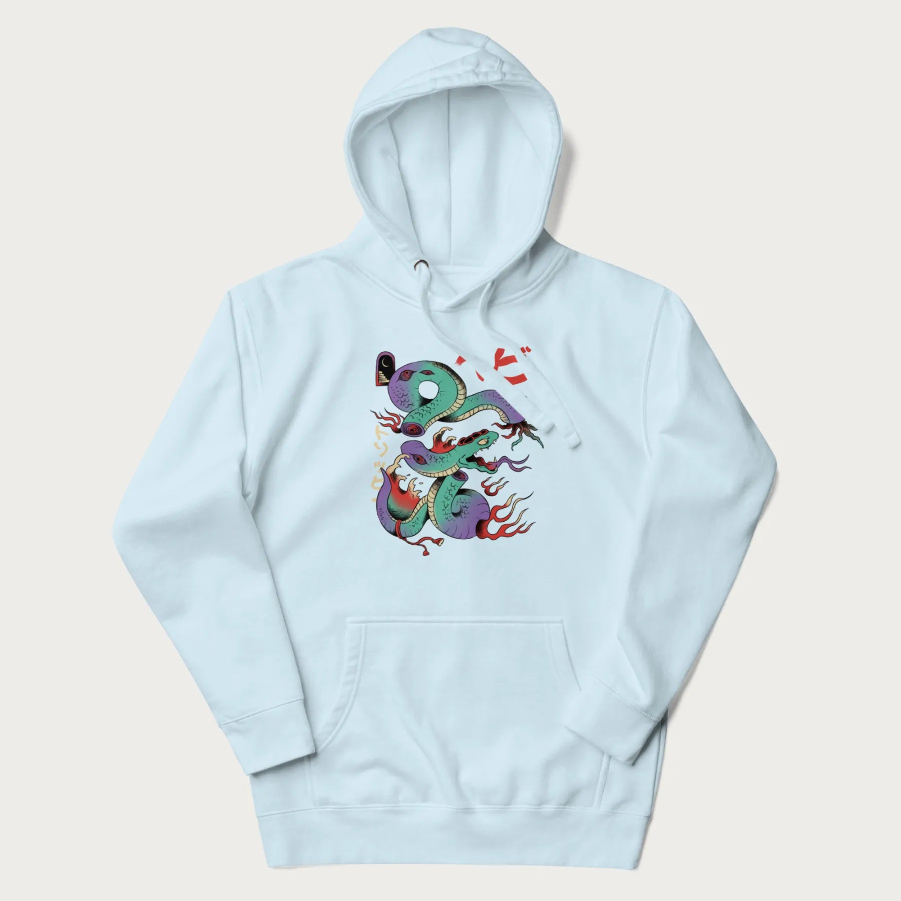 Light blue hoodie with Japanese psychedelic snake graphic, with Japanese text 'ヘビ' (Snake) and 'トリッピー' (Trippy) in vibrant colors.