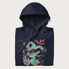 Folded navy blue hoodie with Japanese psychedelic snake graphic, with Japanese text 'ヘビ' (Snake) and 'トリッピー' (Trippy) in vibrant colors.