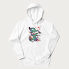 White hoodie with Japanese psychedelic snake graphic, with Japanese text 'ヘビ' (Snake) and 'トリッピー' (Trippy) in vibrant colors.