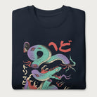 Folded navy blue sweatshirt with a vibrant psychedelic Japanese snake graphic with Japanese text.