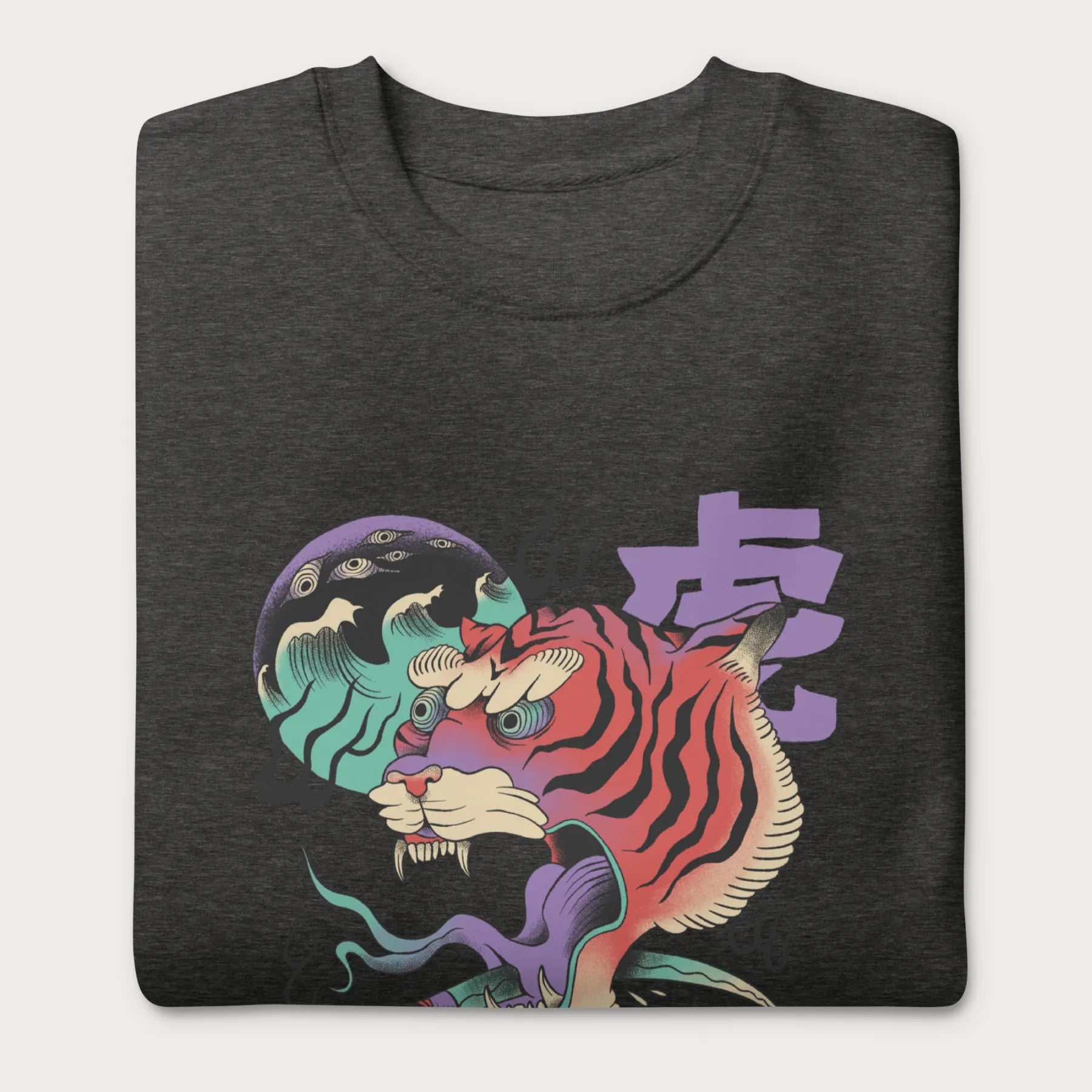 Folded dark grey sweatshirt with a psychedelic Japanese tiger graphic featuring vibrant colors and bold details, including Japanese characters.