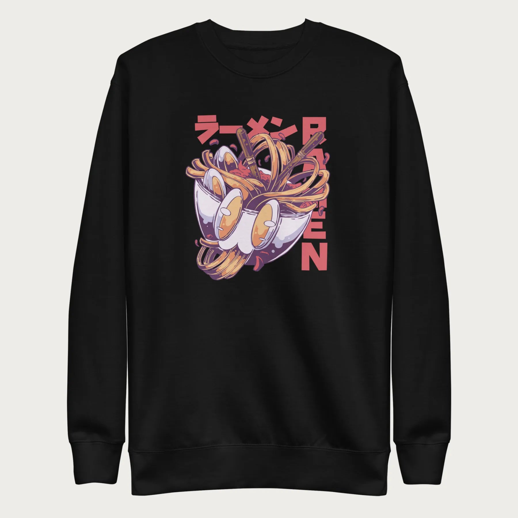 Black sweatshirt with a vibrant graphic of a bowl of ramen noodles, depicted in a dynamic, cartoonish style with bold Japanese text.