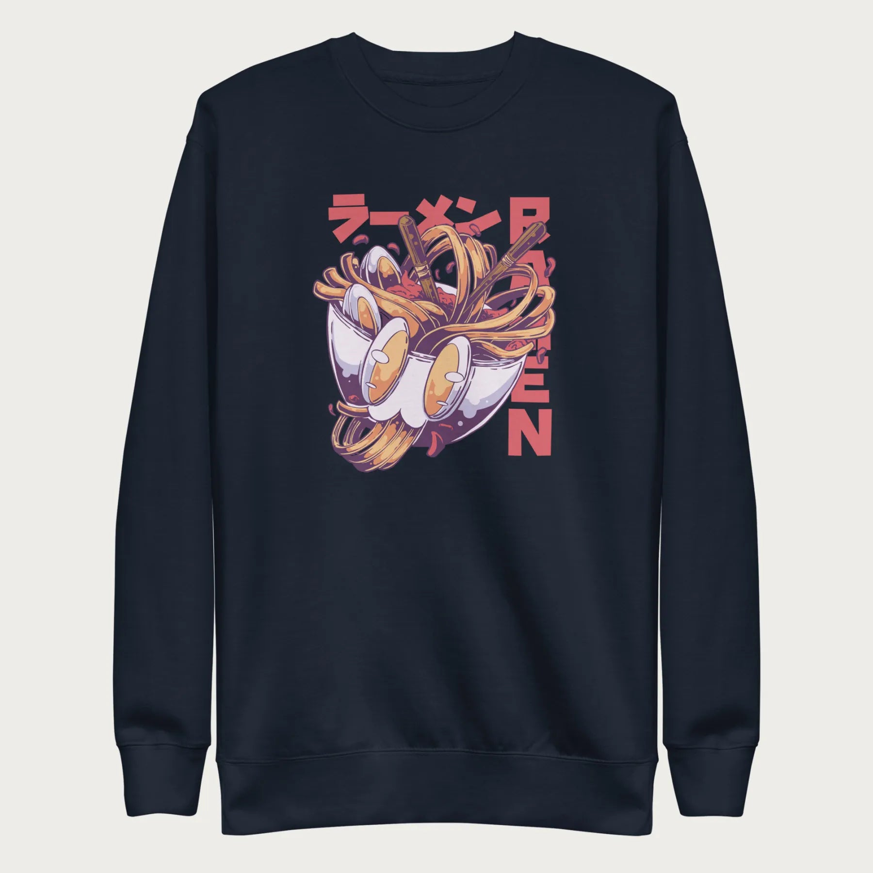 Navy blue sweatshirt with a vibrant graphic of a bowl of ramen noodles, depicted in a dynamic, cartoonish style with bold Japanese text.