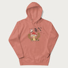 Light pink hoodie with mushroom and butterfly design, with the text 'Respect the Soil' above it. 