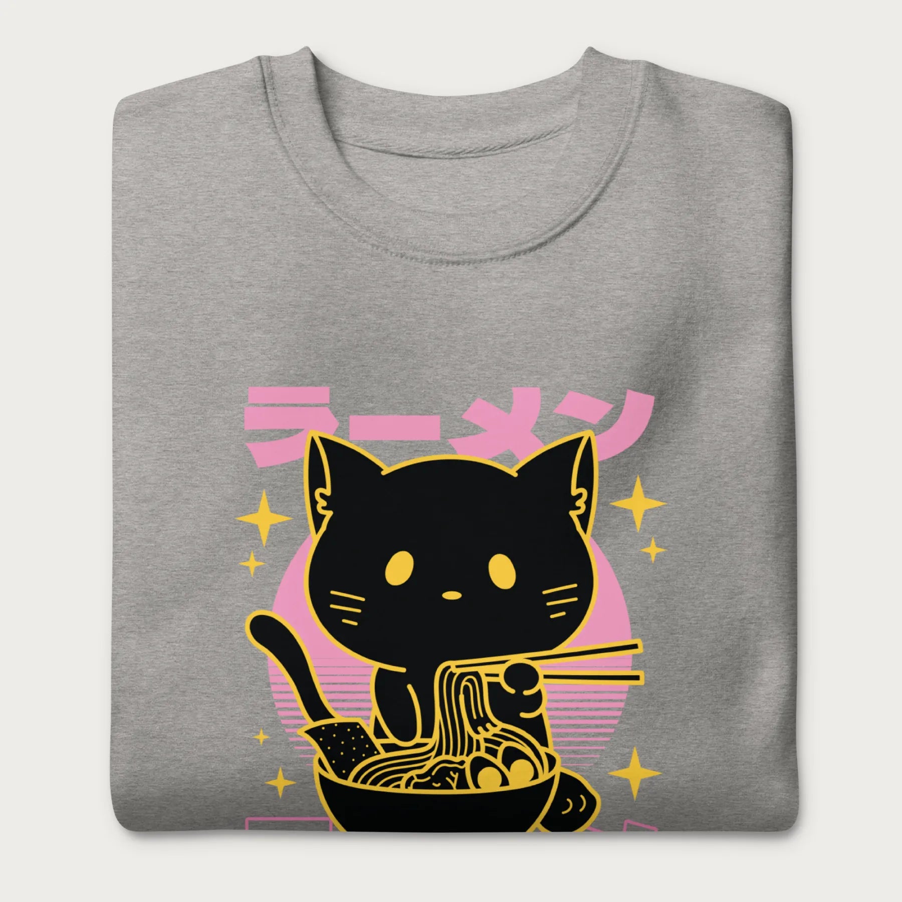 Folded light grey sweatshirt with Japanese text and a neon outline graphic of a cat eating ramen.