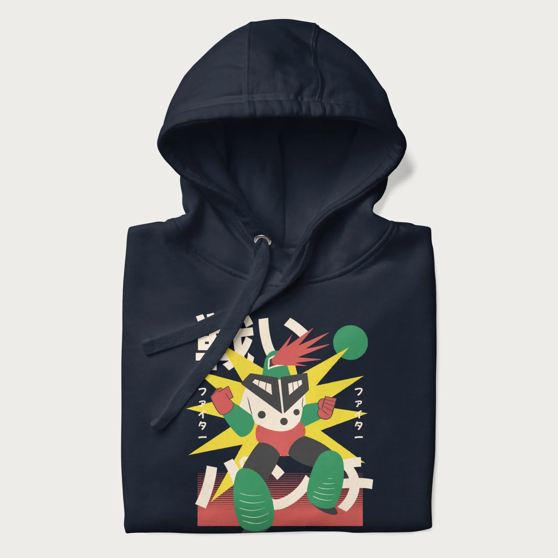 Folded navy blue hoodie with Japanese text and a retro-futuristic robot fighter graphic.