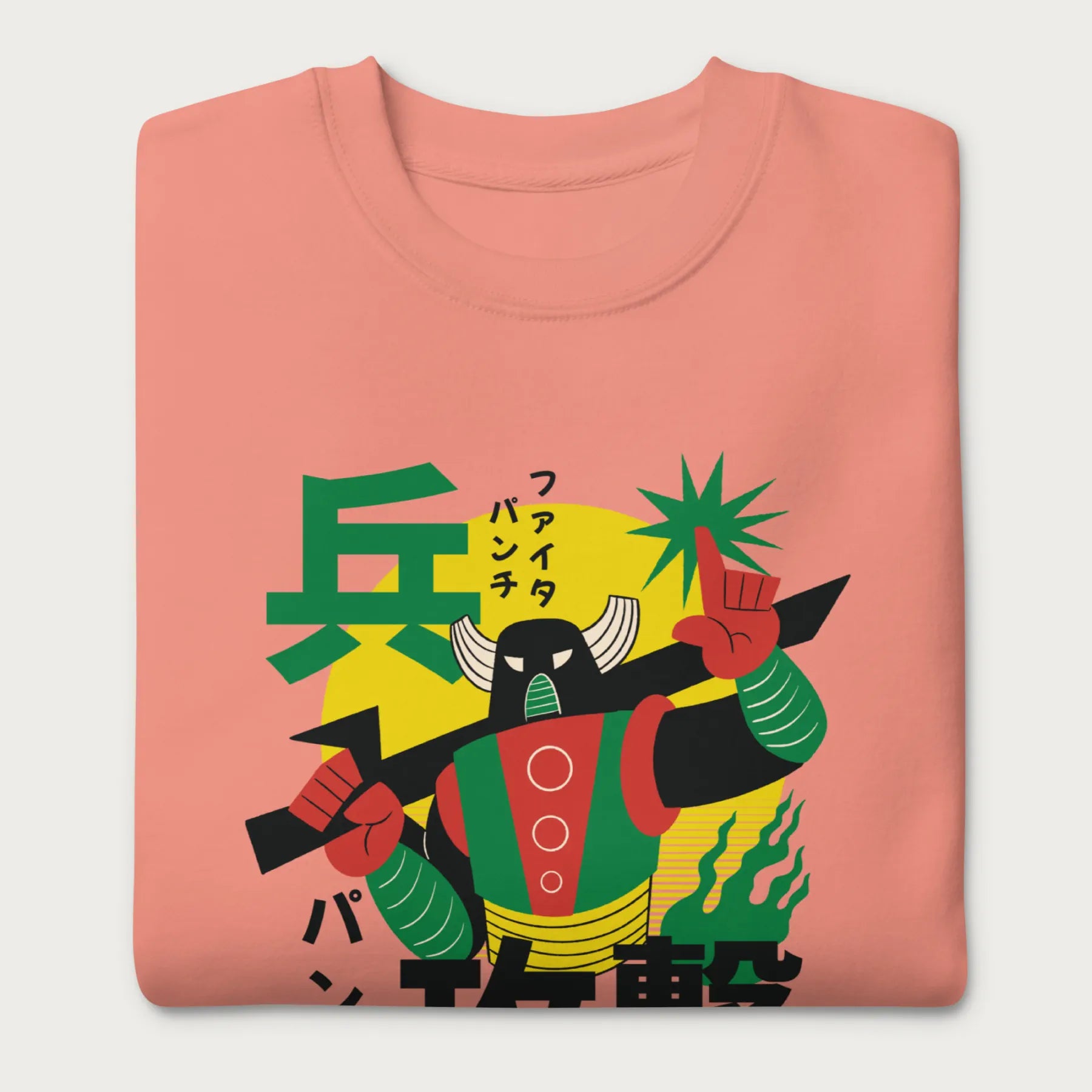 Folded light pink sweatshirt with Japanese text and a retro samurai robot graphic.