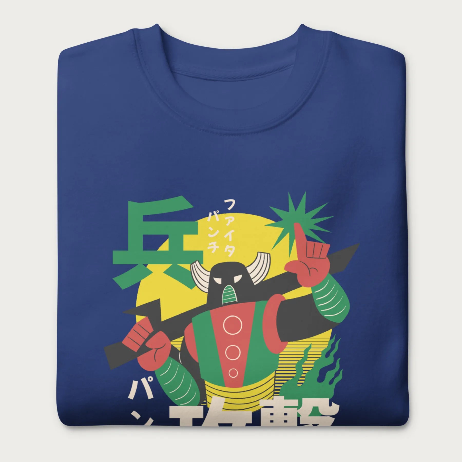 Folded royal blue sweatshirt with Japanese text and a retro samurai robot graphic.