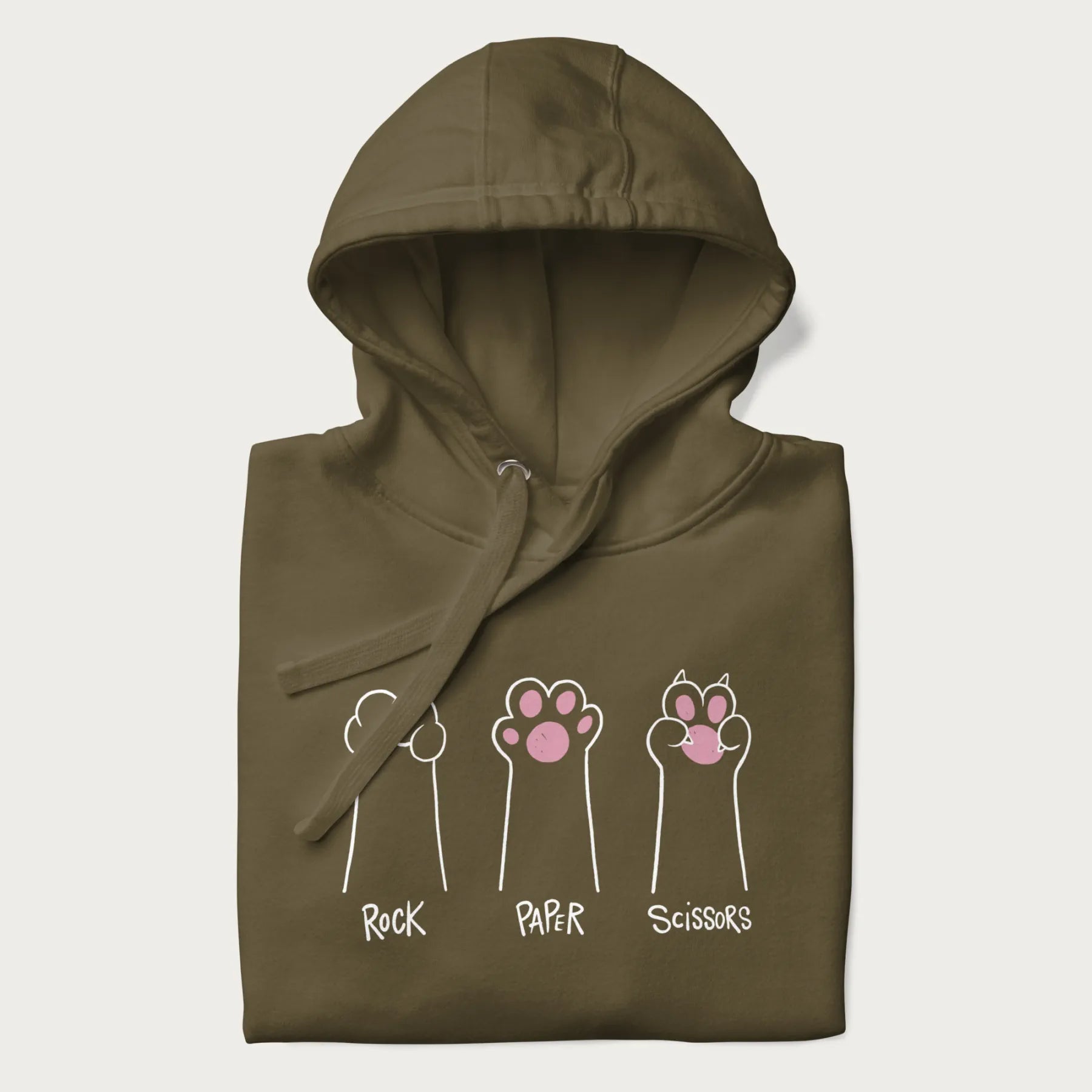 Folded military green hoodie with graphic of cat paws playing rock-paper-scissors.