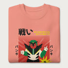 Folded light pink sweatshirt with Japanese text and a retro robot graphic.