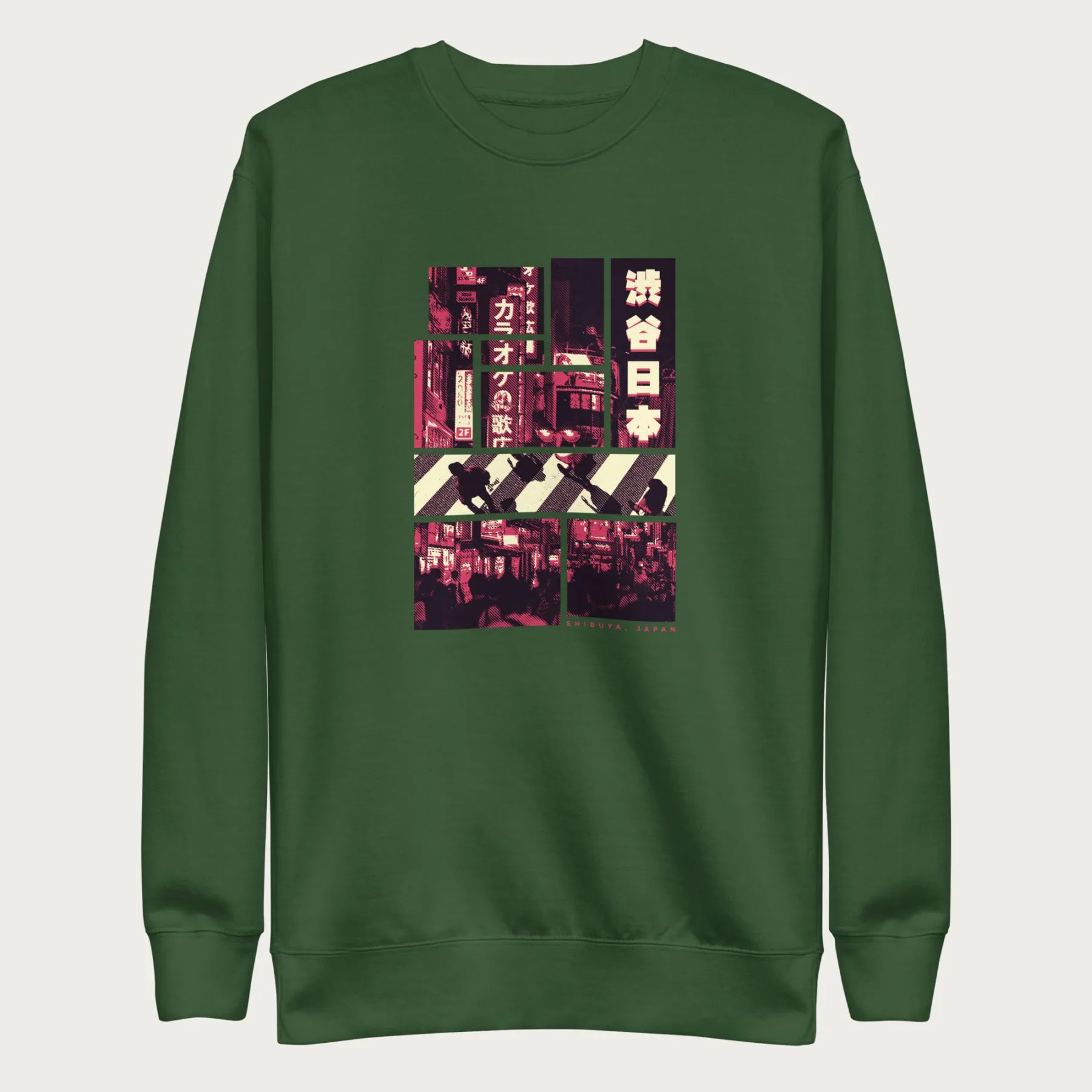 Forest green sweatshirt with a graphic panels of Shibuya's nightlife, featuring the iconic crosswalk, neon signs, and Japanese text.