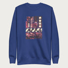 Royal blue sweatshirt with a graphic panels of Shibuya's nightlife, featuring the iconic crosswalk, neon signs, and Japanese text.