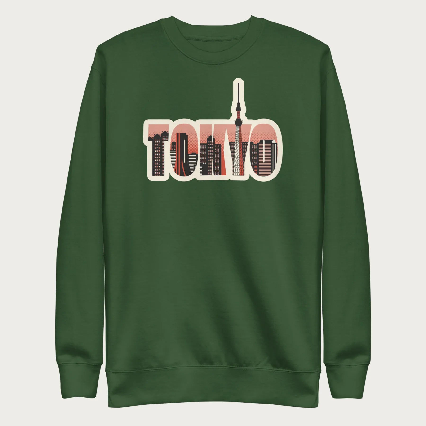 Forest green sweatshirt with a graphic of Tokyo's skyline integrated within the letters spelling "TOKYO."