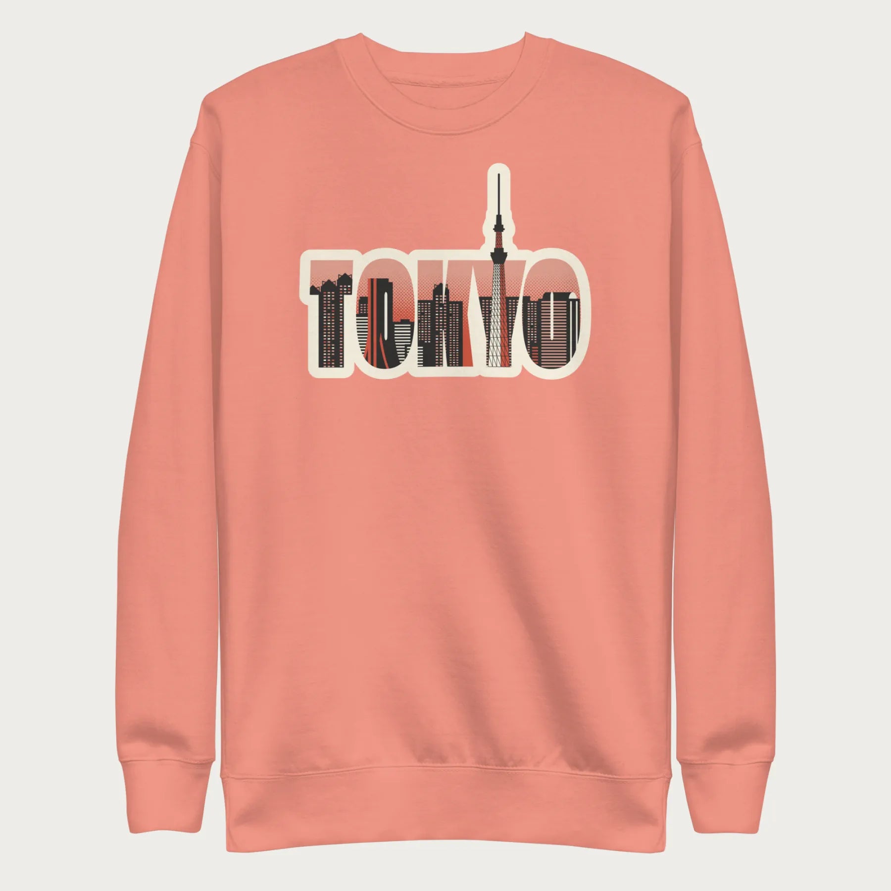 Light pink sweatshirt with a graphic of Tokyo's skyline integrated within the letters spelling "TOKYO."